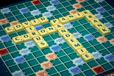 covid lexicon in a scrabble board